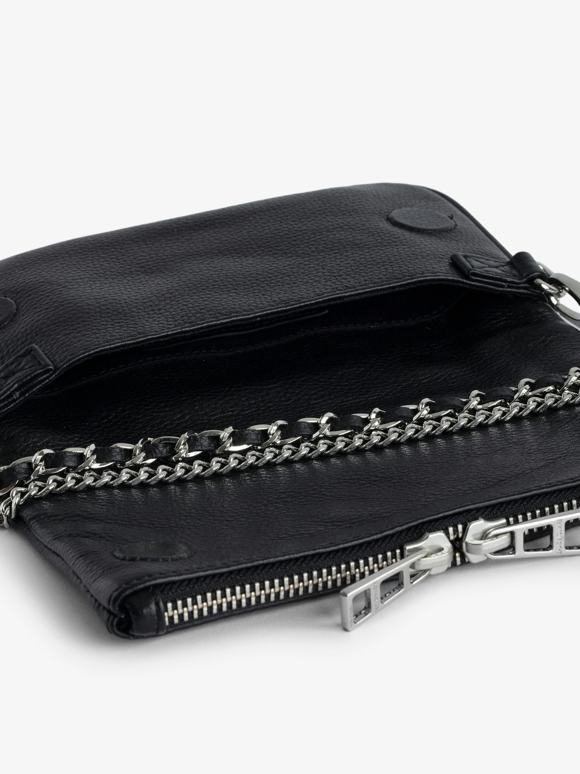 Rock Nano Clutch - Grained leather clutch with double leather and metal chains and rhinestone-adorned wings.